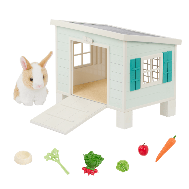 A small plush rabbit toy and hutch